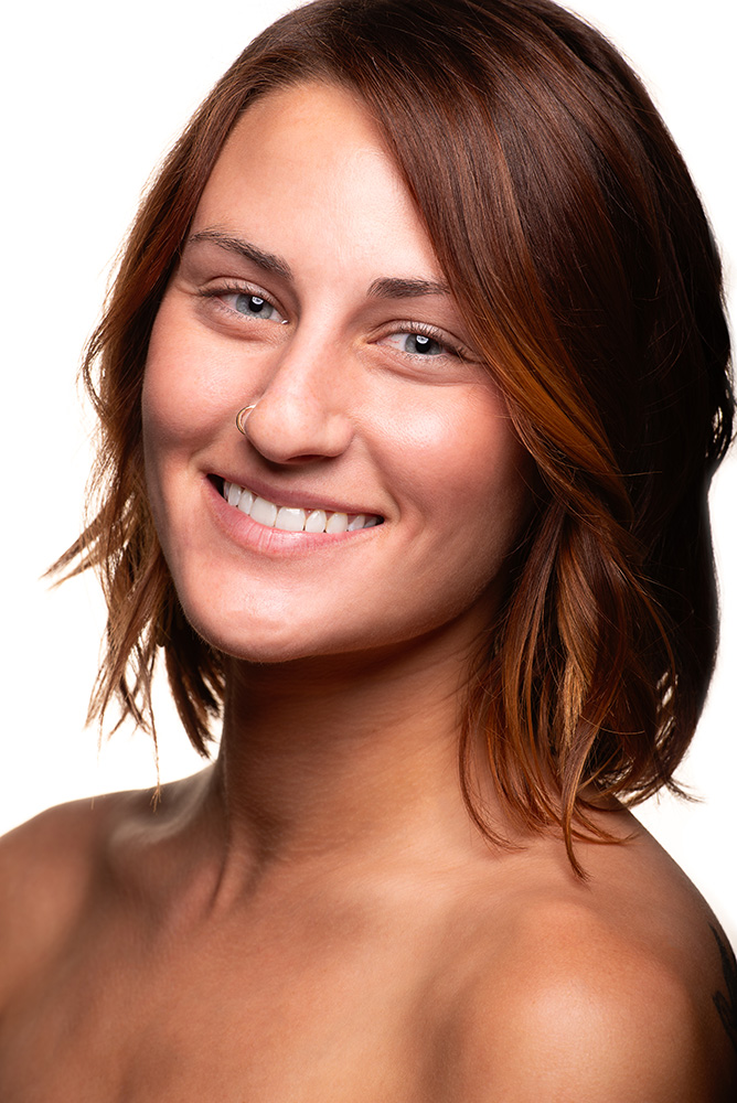 Short dark haired girl smiles at camera in makeup free beauty shot. Alyssa Bryn Photography. Bryssa. Bryssa Blog.