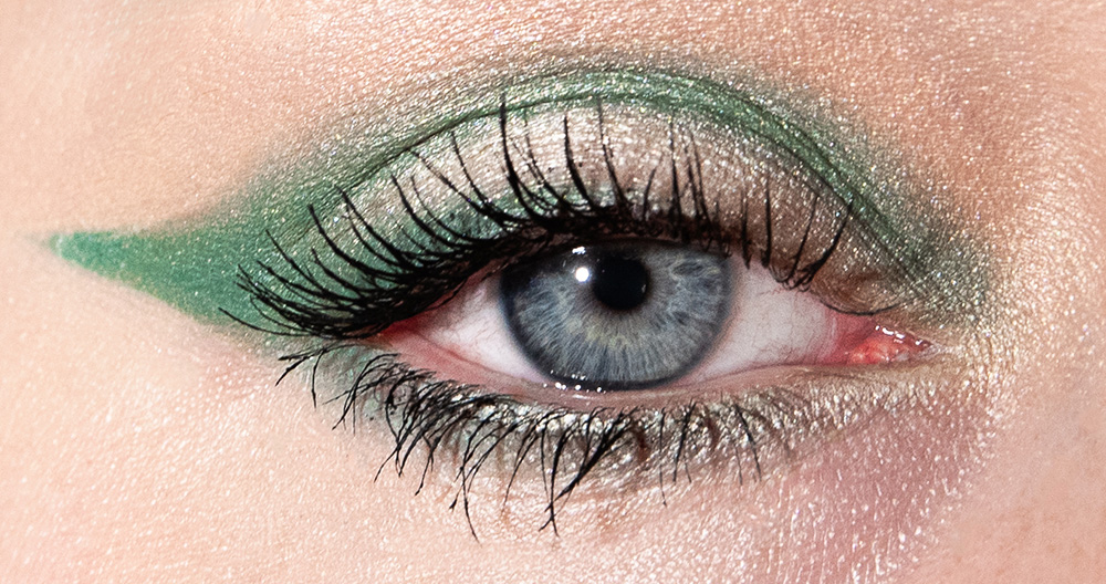 lose up of blue eye with green eyeshodow forming a wing. Alyssa Bryn Photography. Bryssa. Bryssa Blog.