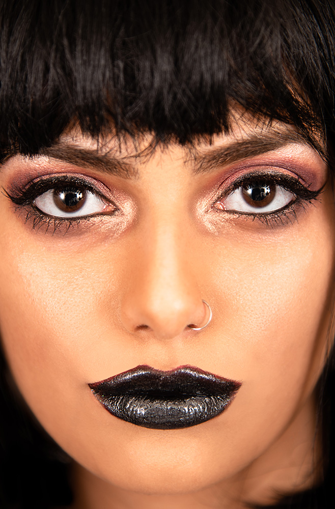 Edgy girl with silver nose ring, dark hair and bangs in dramatic eye makeup and black lipstick. Alyssa Bryn Photography. Bryssa. Bryssa Blog.