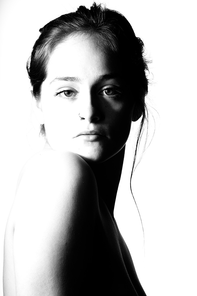 Dark hair girlposing sidewying in highkey beauty photograph. Alyssa Bryn Photography. Bryssa. Bryssa Blog.