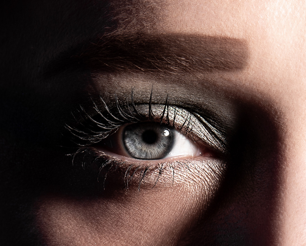 Closeup of blue eye with dramatic side lighting. Alyssa Bryn Photography. Bryssa. Bryssa Blog.