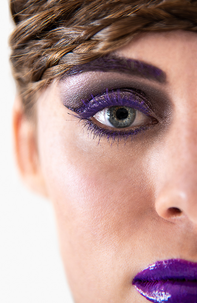 Girl wearing purple eye makeup and purple lipstick with her brown hair in mini braids going across forehead. Alyssa Bryn Photography. Bryssa. Bryssa Blog.