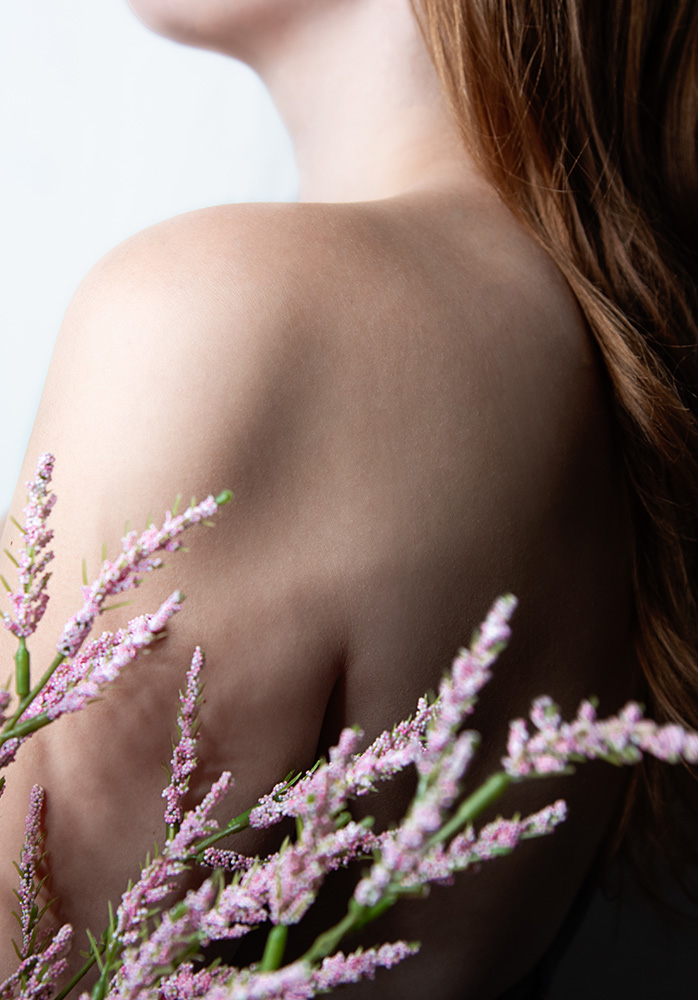 Girl with little pink flowers around her shoulder. Alyssa Bryn Photography. Bryssa. Bryssa Blog.